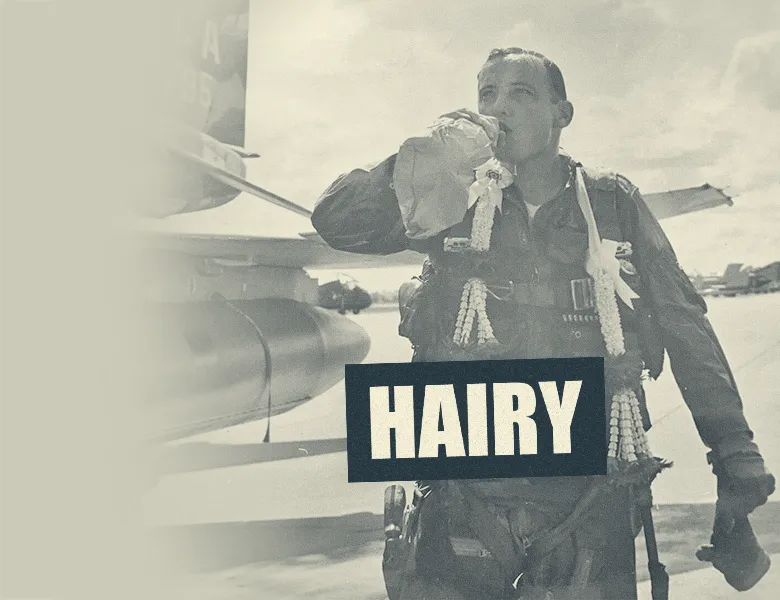 Hairy podcast's main cover. Luke Graves (aka 'Cool Hand Luke') is drinking water after his last mission